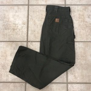 Dark green Carhartt dungaree fit pants